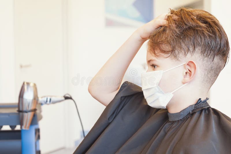 Caucasian Boy Getting Hair Cut at the Barbershop Wearing Mask. New Normal Stock Photo - Image of face, pandemic: 185940146 Caucasian Boy Getting Hair Cut at the Barbershop Wearing Mask. New Normal Stock Photo - Image of face, pandemic: 185940146
