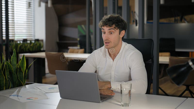 Caucasian businessman excited support negotiate idea talking business video call with laptop close computer happy win royalty free stock photography