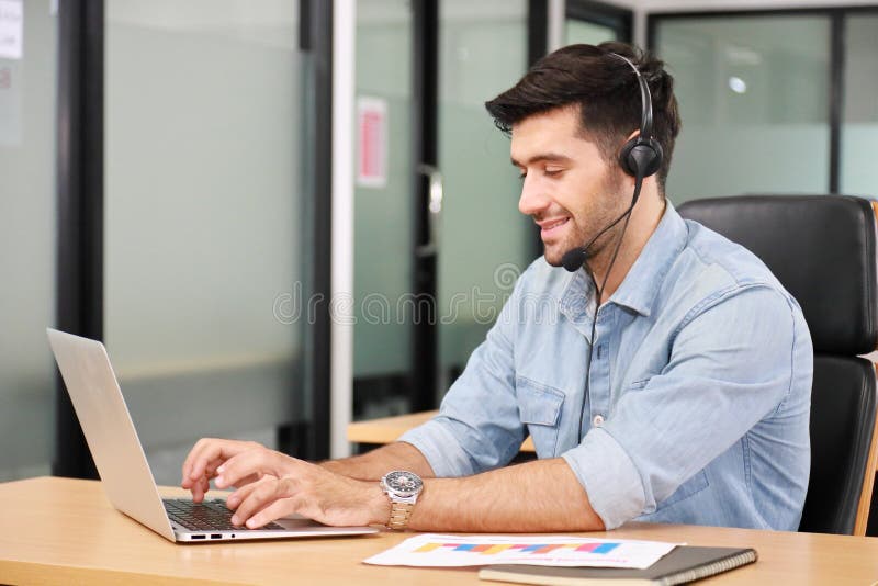 Caucasian businessman IT operator answering online phone call from customer as 24/7 customer service with copy space