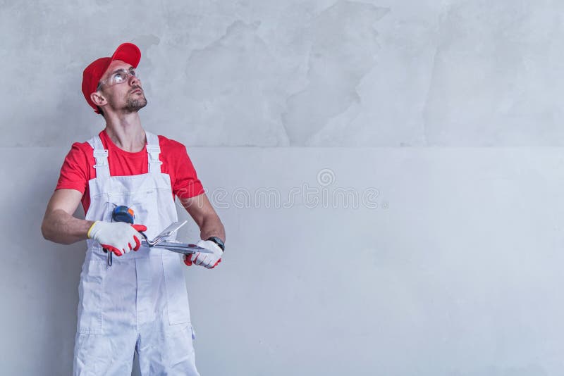 Contractor Wall Patching stock photo. Image of industry 120976660