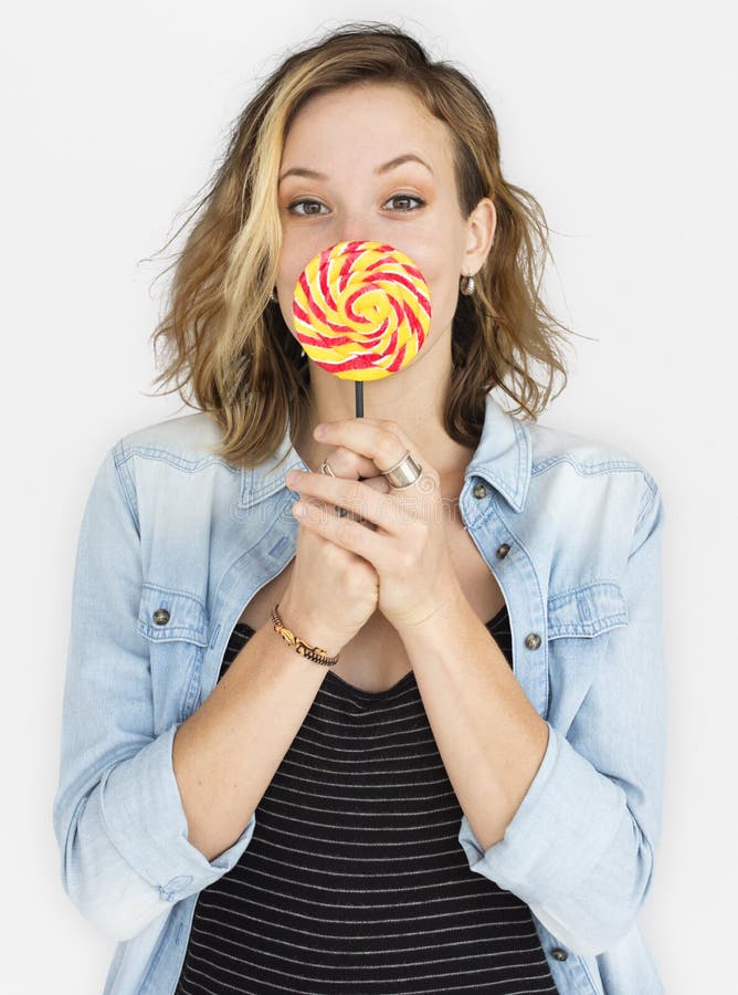 Caucasian dam Lollipop Smile Concept fotografering för bildbyråer Caucasian dam Lollipop Smile Concept fotografering för bildbyråer