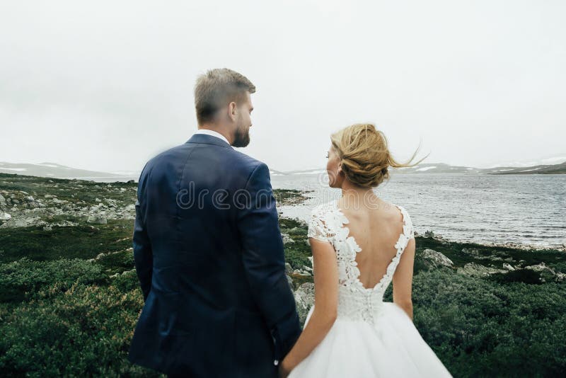 Caucasian happy romantic young couple celebrating their marriage