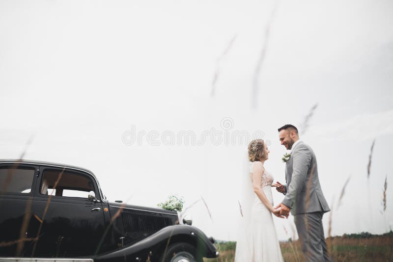 Caucasian happy romantic young couple celebrating their marriage. Outdoor