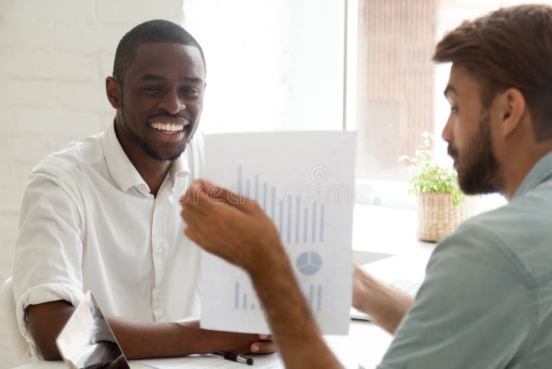 Caucasian investment advisor consulting african american client royalty free stock photo Caucasian investment advisor consulting african american client royalty free stock photo