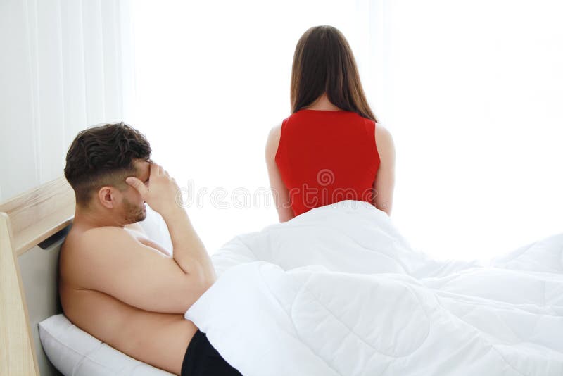 Caucasian Lover Couple on the Bed Unhappy in Having Sex and Have Problems in Relationship of Married Life pic