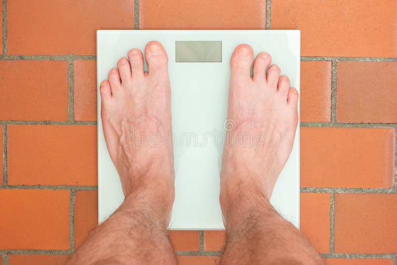 Male Feet Glass Scales Men's Diet Body Weight Close Stock Photo by  ©YAYImages 323776374