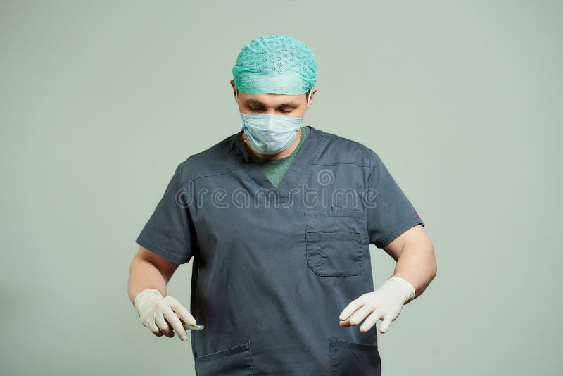 Surgeon Holding A Scringe Menacingly High-Res Stock Photo - Getty Images