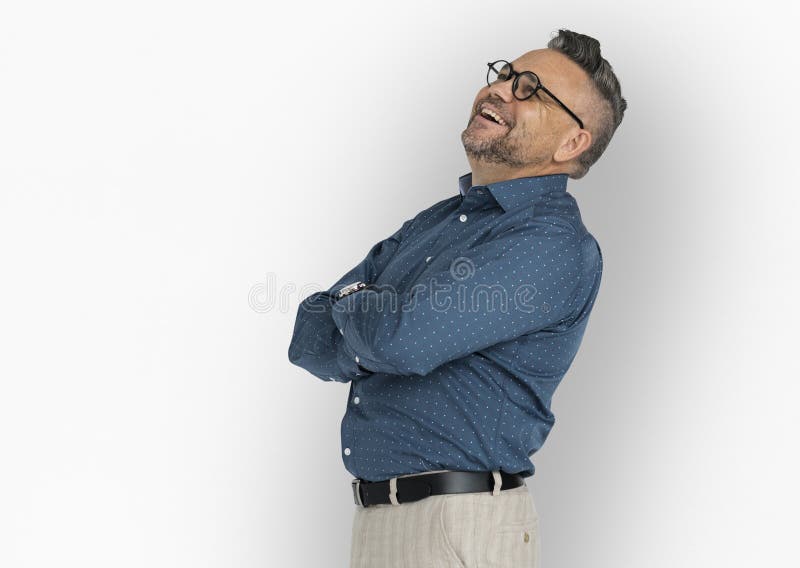 Caucasian Man Folding Arms Smiling stock photo