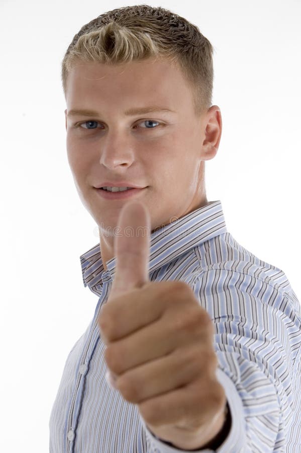 Caucasian man showing thumb