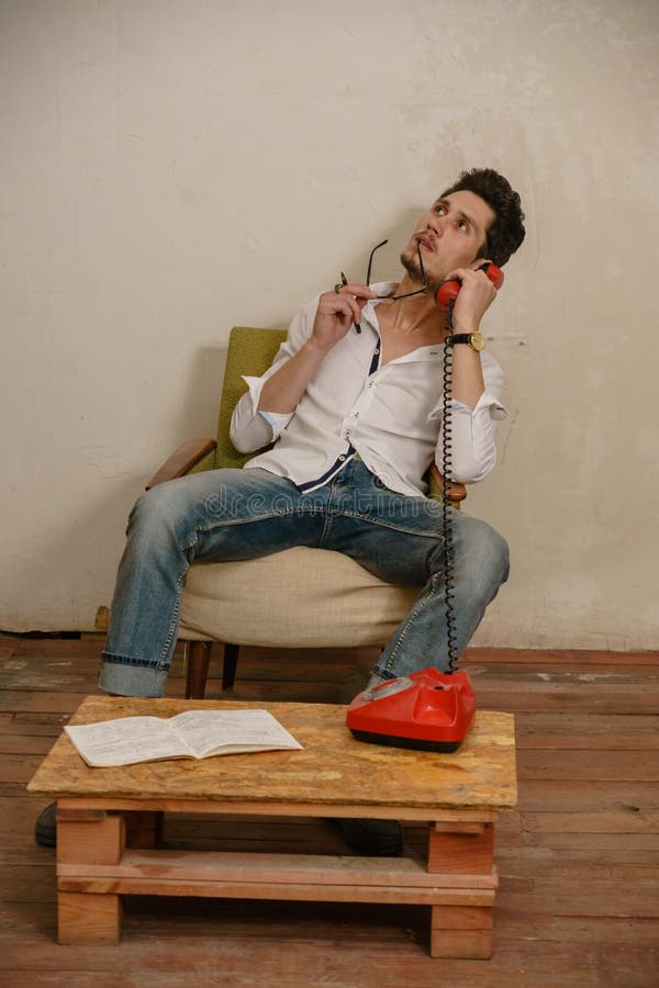 A caucasian man is talking on the phone stock photo A caucasian man is talking on the phone stock photo