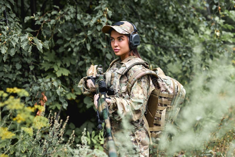 Military Lady Woman in Tactical Gear Posing for Photo in Forest