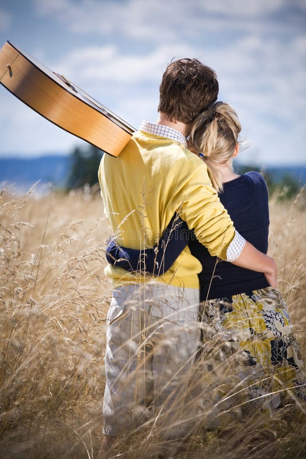 A shot of a young caucasian couple in love outdoor. A shot of a young caucasian couple in love outdoor