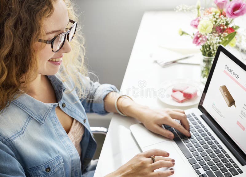 Caucasian woman creative shoot working on laptop