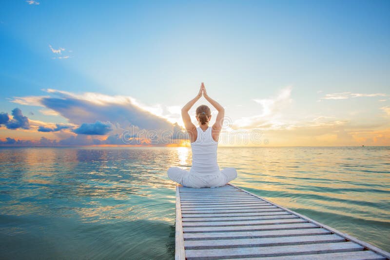 Caucasian woman practicing yoga