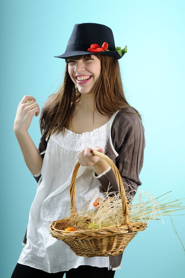 Caucasian woman showing easter basket