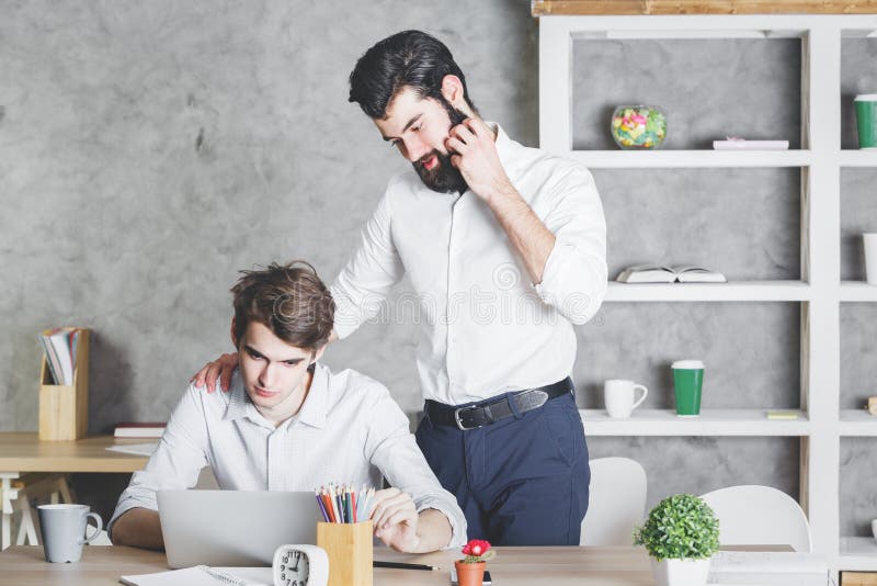 Caucasian worker with supervisor stock photography