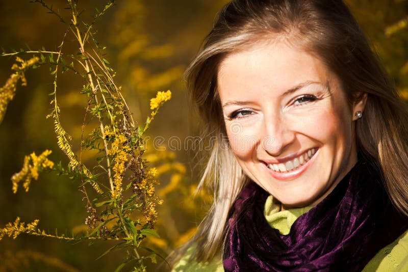 Caucasian young adult blond woman outdoor fall tim