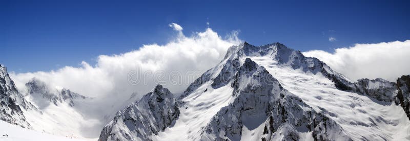 Mountain panorama. Caucasus, Dombay. View from the ski slope. Mountain panorama. Caucasus, Dombay. View from the ski slope.