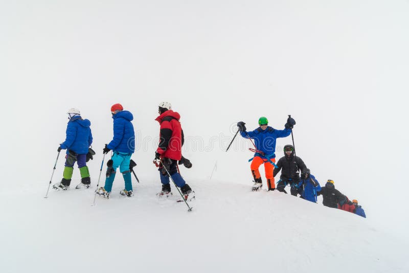Caucasus / Russia 07.15.2018 Group of Climbers Climbing Mountain