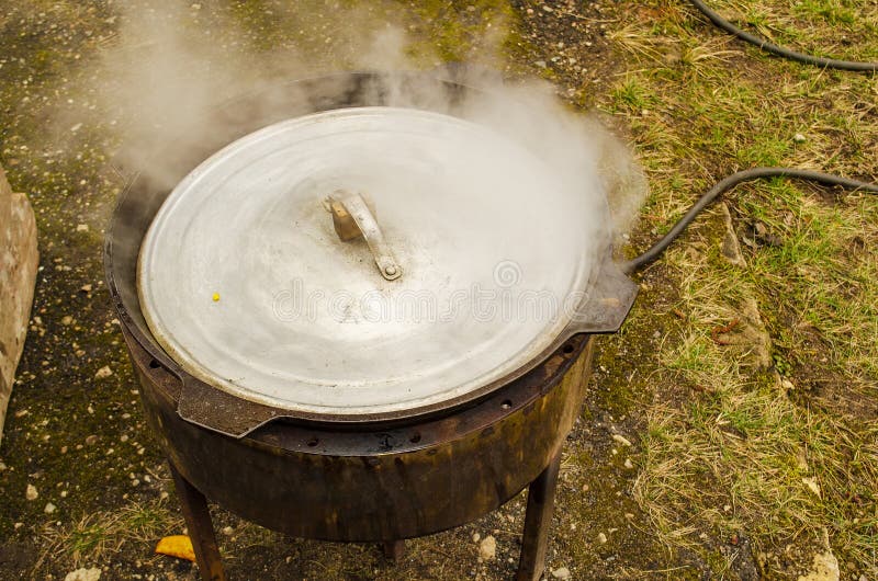 Cauldron on fire stock photo. Image of dish, outdoors 176950878