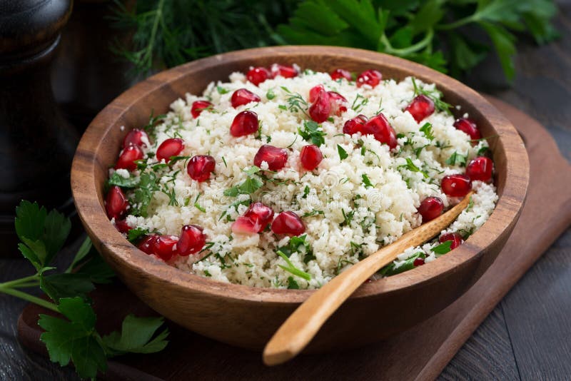 Cauliflower couscous with herbs and pomegranate, closeup