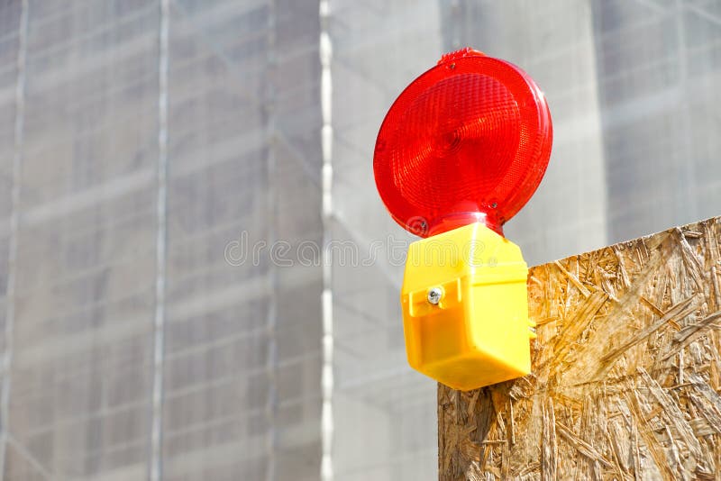 A Caution Flashing Lamp at Hazard Zone Stock Photo Image of barrier