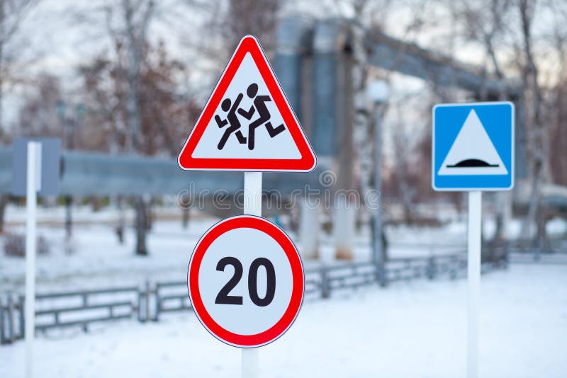 Caution sign children on the Playground in winter stock images