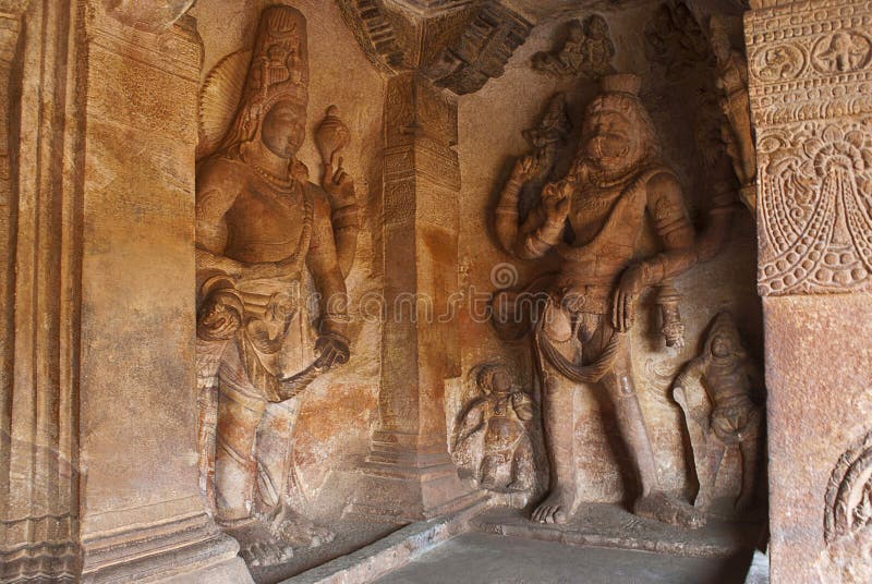 Cave 3 : Carved figure of Vishnu as Narasimha, half human, half lion, on the right and Harihara, a syncretic sculpture of Vishnu a