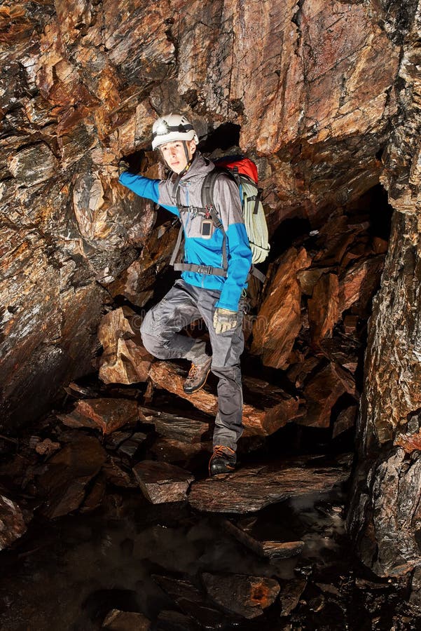 Cave Exploration with Helmet and Headlight Stock Photo - Image of caver ...