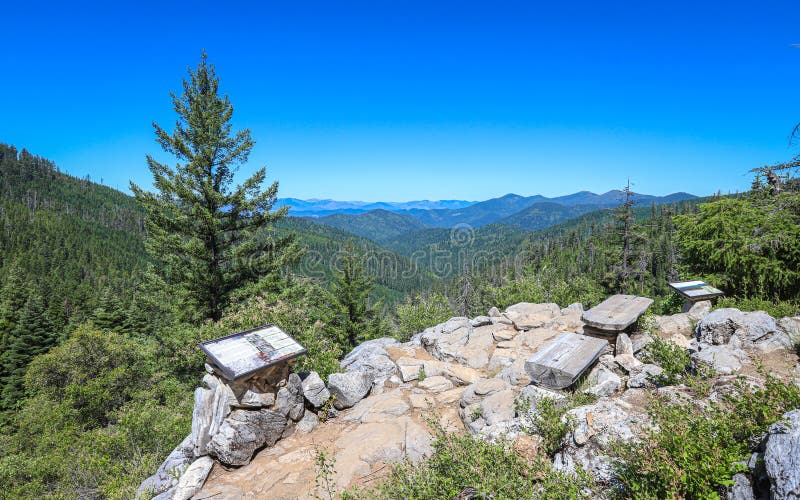 A vista point overlooking Siskiyou National Forest along the Cliff Nature Trail at Oregon Caves National Monument. A vista point overlooking Siskiyou National Forest along the Cliff Nature Trail at Oregon Caves National Monument.