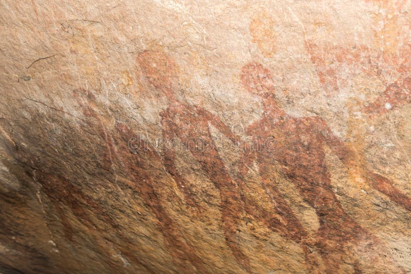 Cave paintings on the wall, painted ocher rock. prehistoric man, the primitive Neanderthal. the leader of the tribe, the shaman, pets, native. The Stone Age. These painting located in Phu Phra bat his