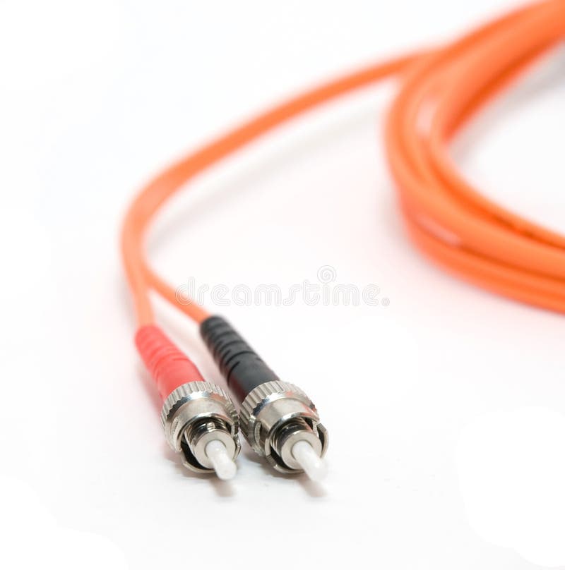 An orange fiber cable with connectors. An orange fiber cable with connectors
