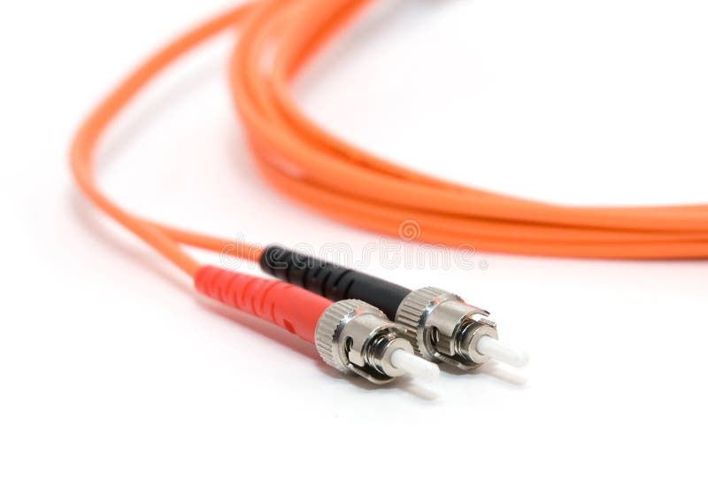 An orange fiber cable with connectors. An orange fiber cable with connectors