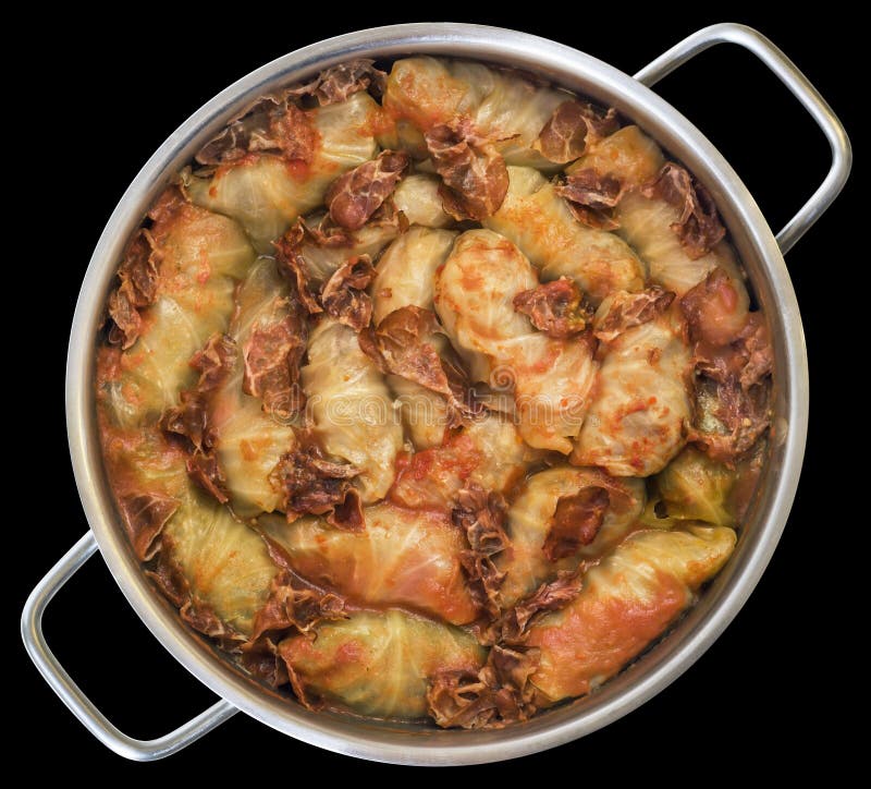 Cavolo marinato Rolls farcito con carne tritata cucinata con Ham In Stainless Steel Saucepot affumicato isolato su fondo nero fotografia stock libera da diritti Cavolo marinato Rolls farcito con carne tritata cucinata con Ham In Stainless Steel Saucepot affumicato isolato su fondo nero fotografia stock libera da diritti