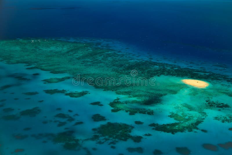 Aerial View of Sandy Upolu Cay Amid Reefs in the Great Barrier Reef Marine Park in Australia. Aerial View of Sandy Upolu Cay Amid Reefs in the Great Barrier Reef Marine Park in Australia