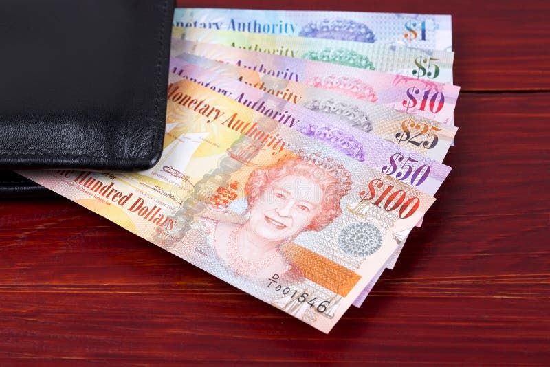 cayman islands dollar black wallet wooden background 164429054 Cayman Islands Dollar Photos - Free & Royalty-Free Stock Photos from Dreamstime