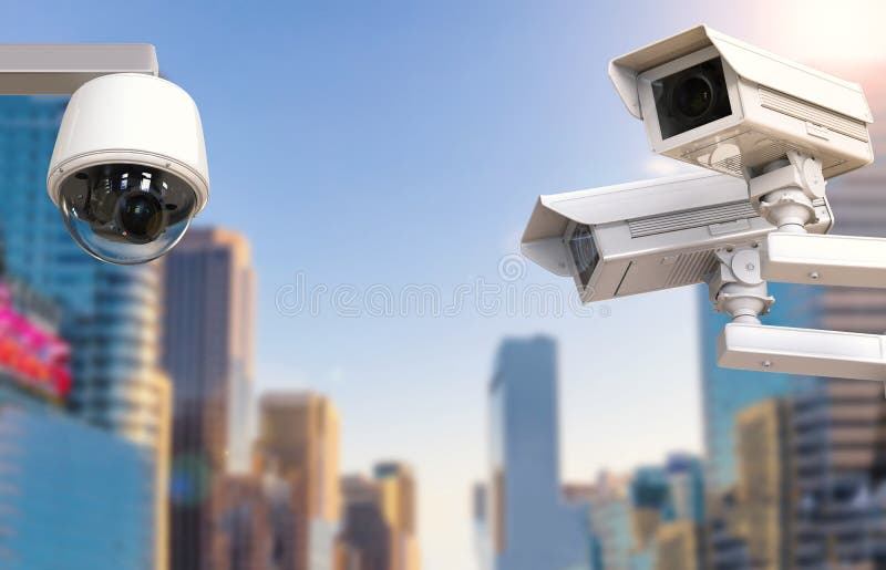 Cctv Camera or Security Camera on Cityscape Background Stock Photo