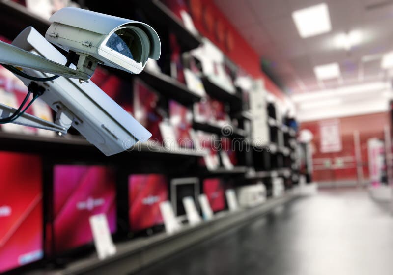 Телевизоры камеры видеонаблюдения стоковое фото. Video Surveillance in Retail Stores. Cloud CCTV.