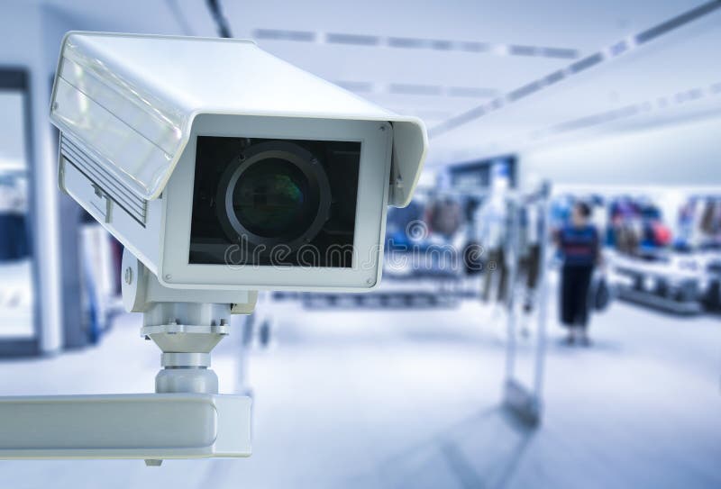Cctv-Kamera oder -Überwachungskamera auf Einzelhandelsgeschäft verwischten Hintergrund