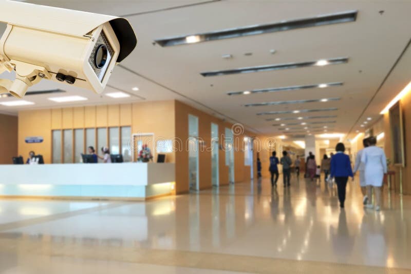 CCTV Security Camera Operating in Hospital Blur Background Stock Photo