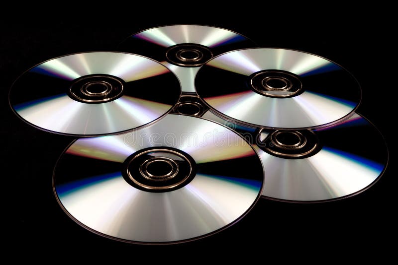 CD e DVD isolati fotografie stock libere da diritti CD e DVD isolati fotografie stock libere da diritti