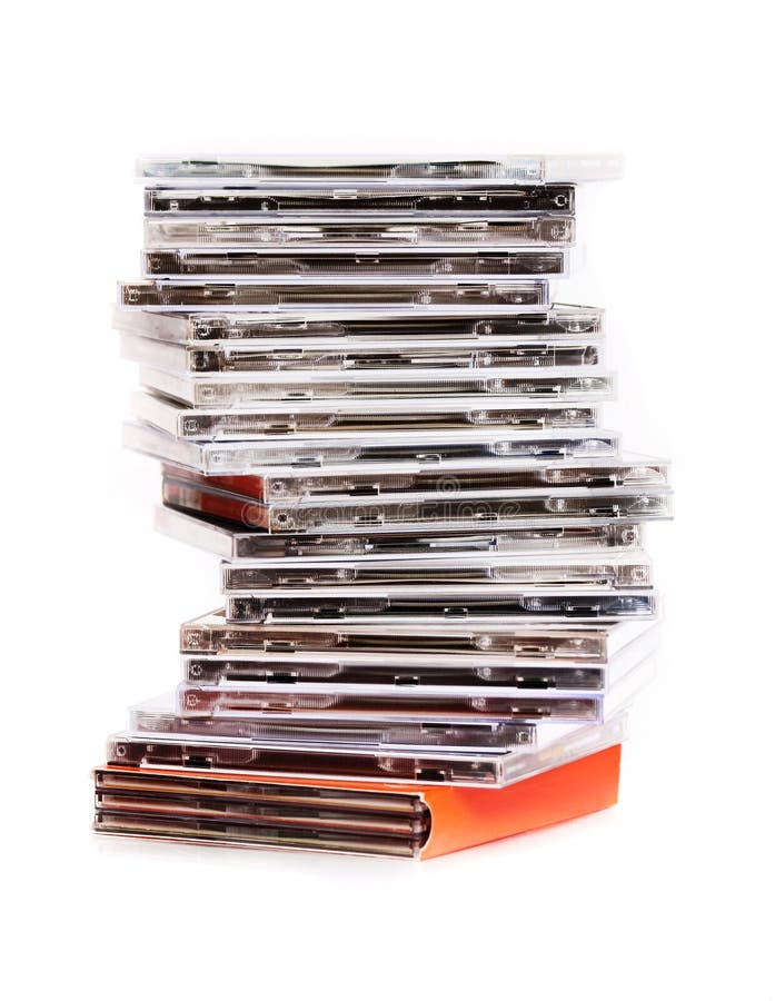 An untidy pile of music cd albums in their cases,. An untidy pile of music cd albums in their cases,