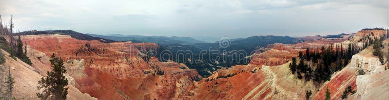 A panorama of the red canyons of Cedar Breaks National Monument near Brian Head, Utah, USA. A panorama of the red canyons of Cedar Breaks National Monument near Brian Head, Utah, USA.