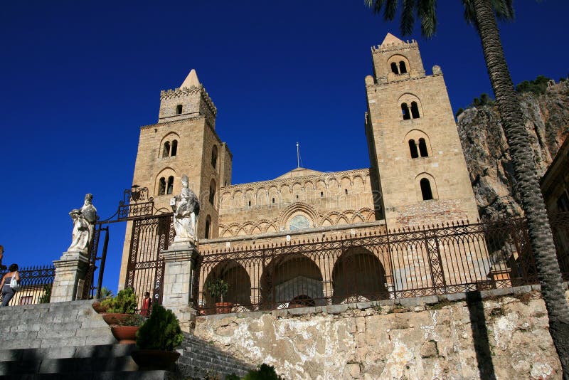 Cefalu cathedral on summer sky; Sicily