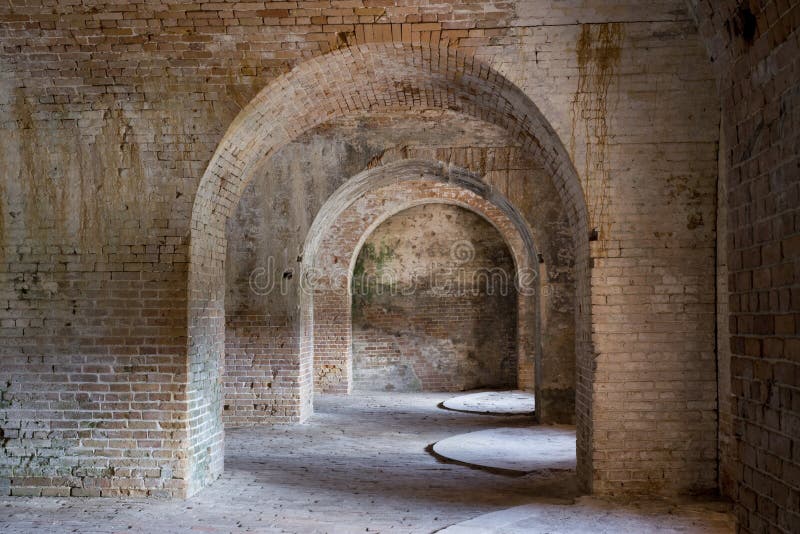 Old brick arches inside an old fort in Florida completed in 1834. Old brick arches inside an old fort in Florida completed in 1834.