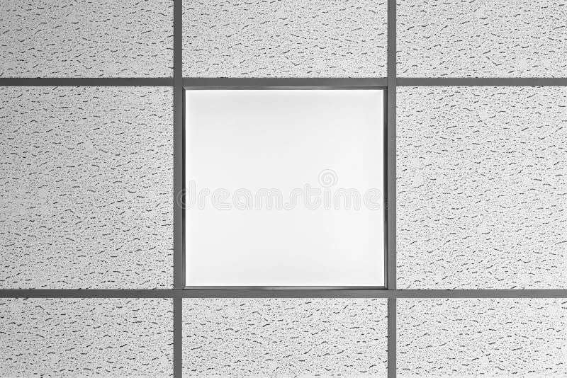 Ceiling Of Square Porous Plates And Built In Led Lamp Stock