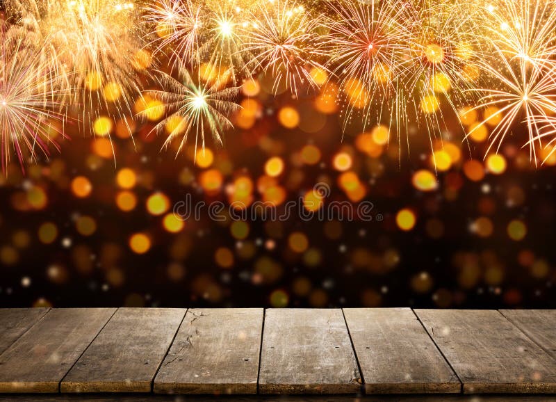 Celebration background with fireworks explosions and empty wooden planks