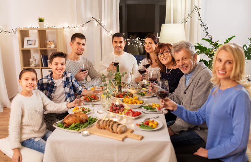 Happy Family Having Dinner Party at Home Stock Photo - Image of child