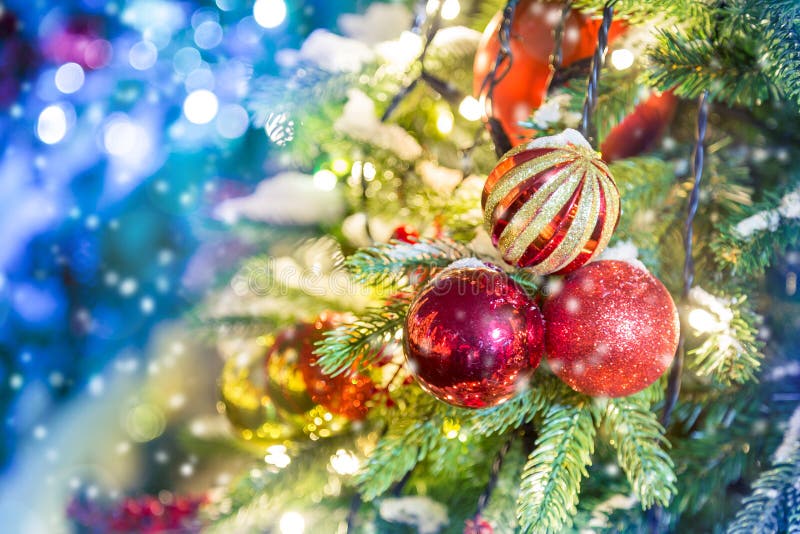 Celebration of New Year and Christmas background. Details of a Christmas tree. Detail shot of Christmas tree branches with stock images Celebration of New Year and Christmas background. Details of a Christmas tree. Detail shot of Christmas tree branches with stock images