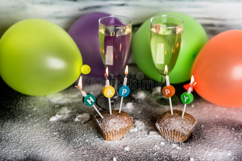 Download Celebration -two Glasses Of Champagne And Sweet Cupcakes On A Background Of Colored Balloons ...